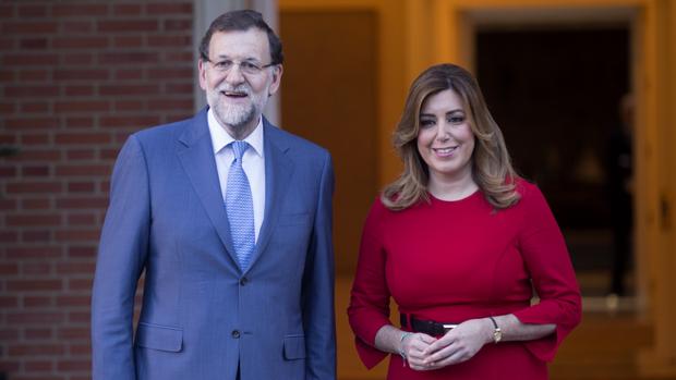 El presidente del Gobierno y del PP, Mariano Rajoy, junto a la presidenta andaluza Susana Díaz